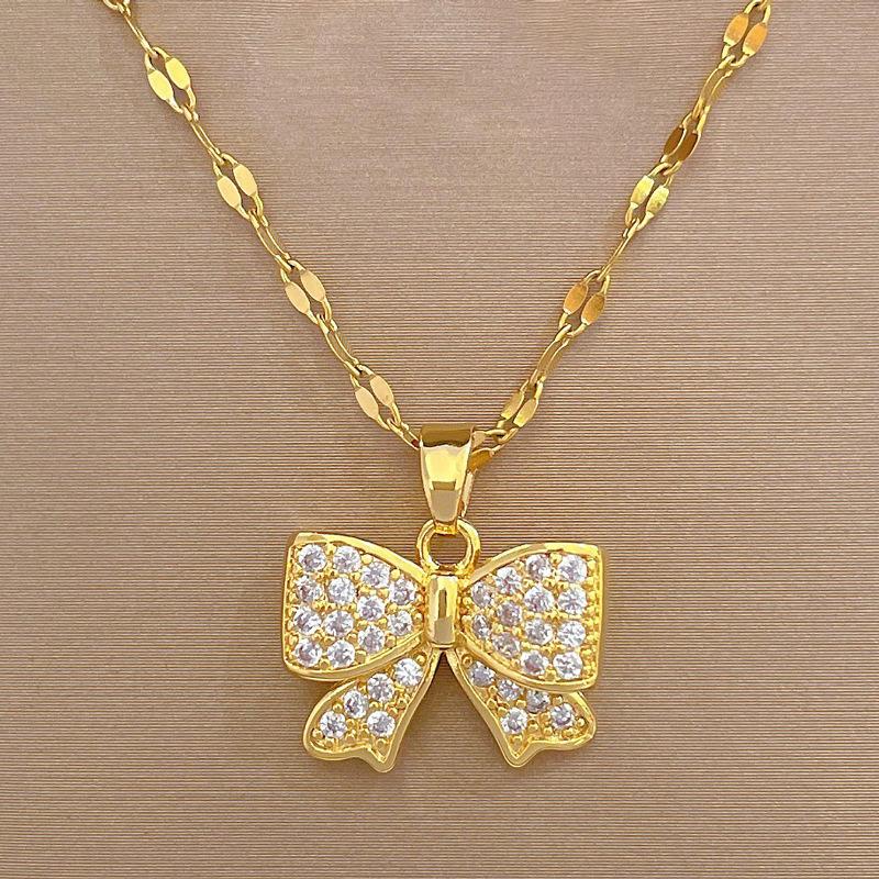 Glimmer Bow Charm Necklace 1