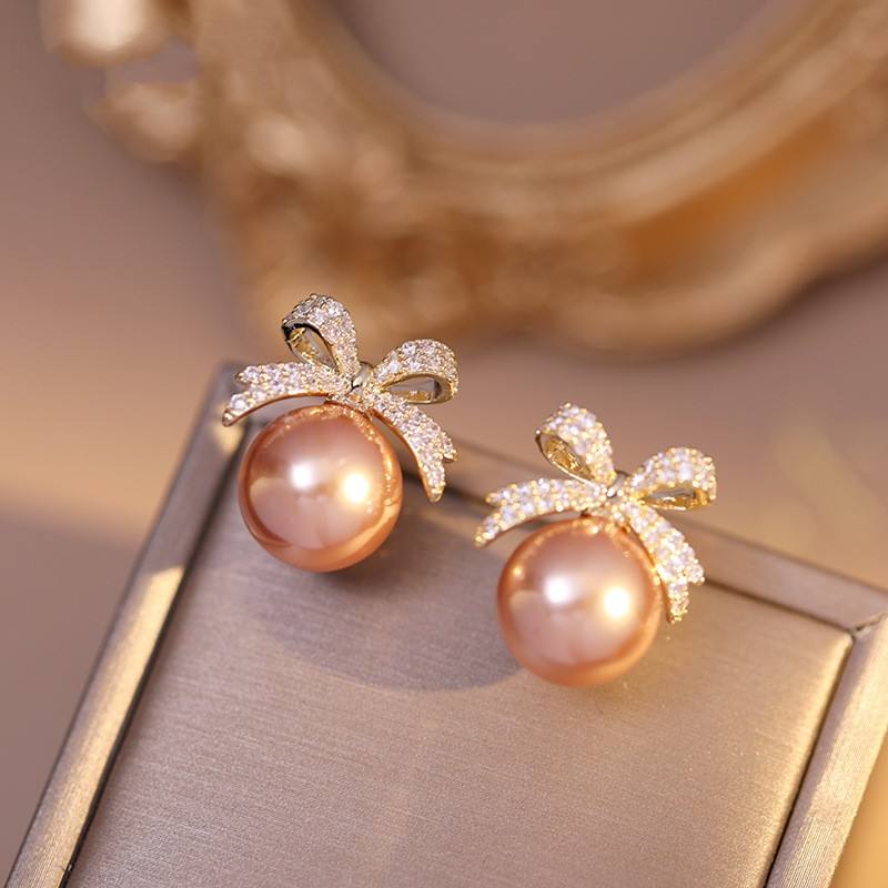Shimmering-Bow-and-Pearl-Earrings 1
