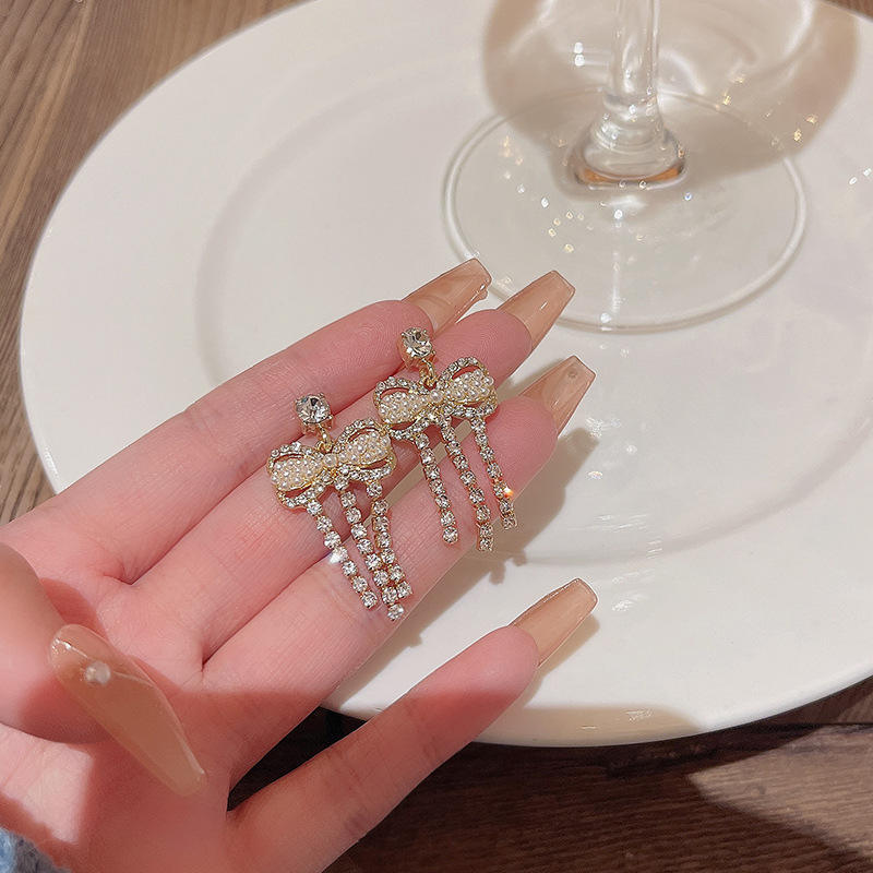 Crystal-Bow-Tassel-Earrings 1