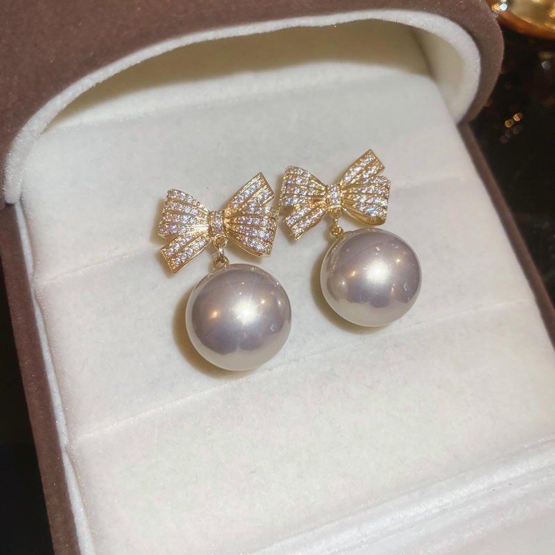 Crystal-Bow-and-Pearl-Earrings 1