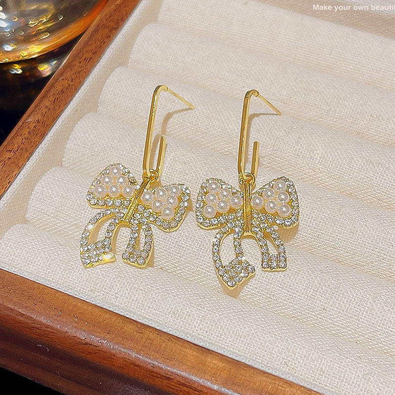 Crystal-Bowknot-Dangle-Earrings 1