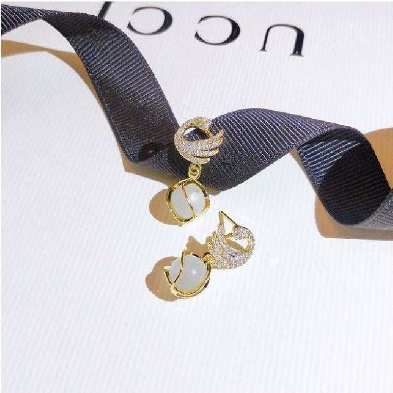 Crystal-Swan-Caged-Pearl-Earrings 3