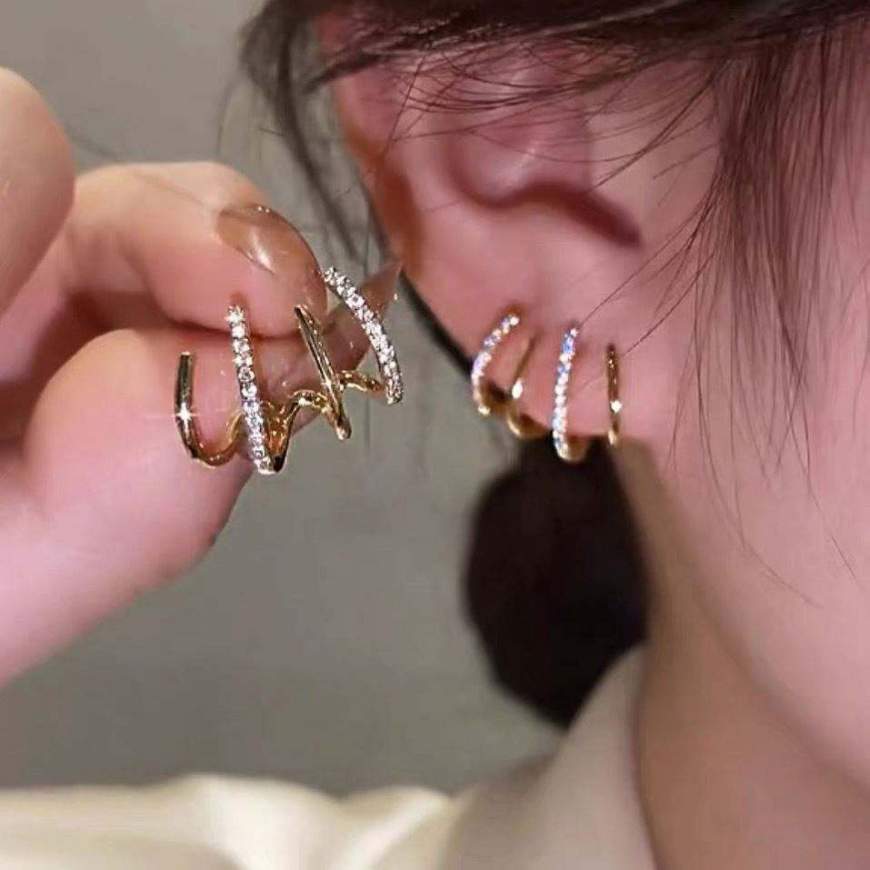 Gold-and-Crystal-Claw-Earrings 1