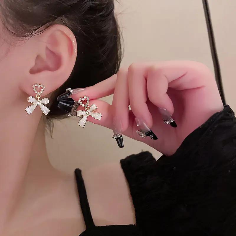 Pearl Heart & Bow Drop Earrings