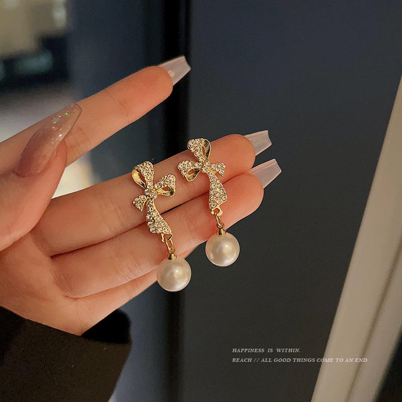 Rhinestone-Bow-Pearl-Drop-Earrings 1